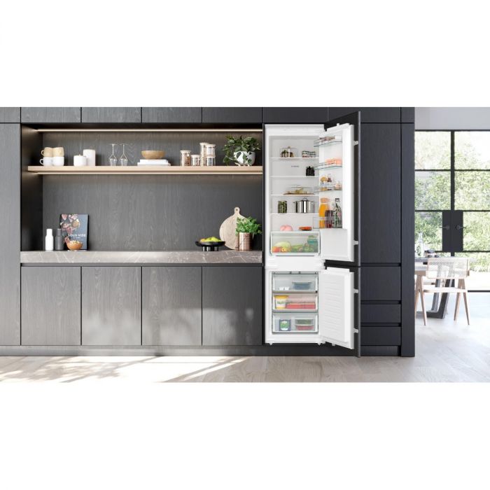 Integrated fridge freezer store extra tall